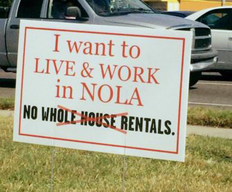 streetsign in new orleans protesting single family home rentals